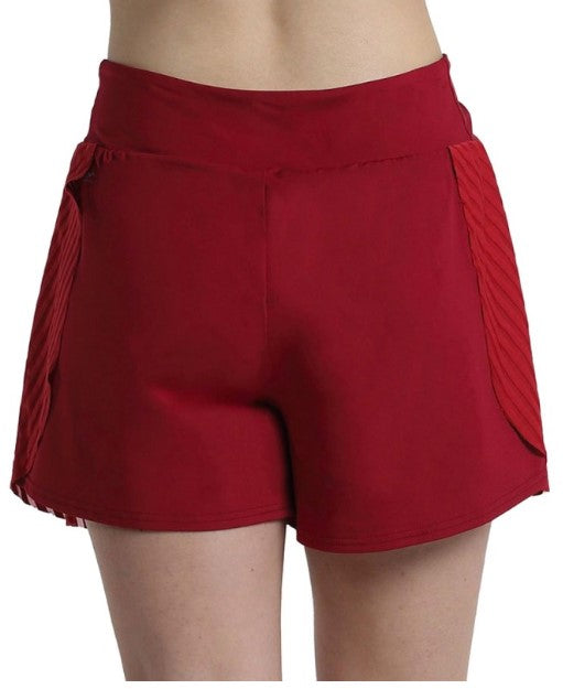Rear view showing inner fitted shorts layer on red Bullpadel Exito women's skort